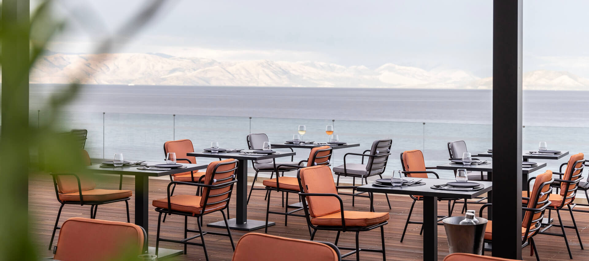 Outdoor space with chairs and tables at Valmar Corfu Viru restaurant
